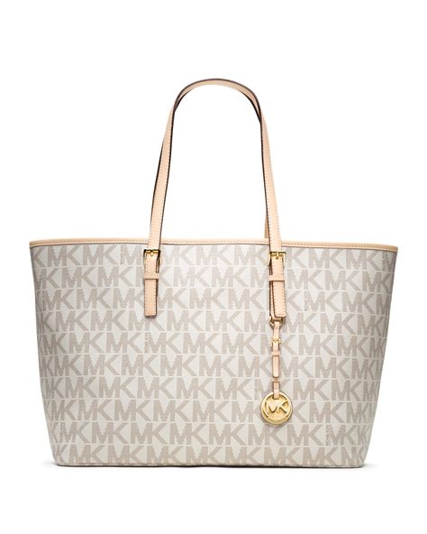 michael kors jet set travel tote white|michael kors bag with airplanes.